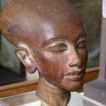 Red granite head of Nefert-iti